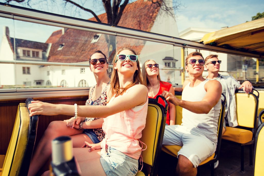 Men and women on tour bus