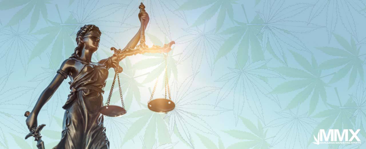 Image of Lady Justice with a marijuana leaf background